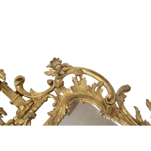 2023 - A GEORGIAN STYLE GILTWOOD CHINESE CHIPPENDALE WALL MIRROR with stylized carved pagoda surmount ... 