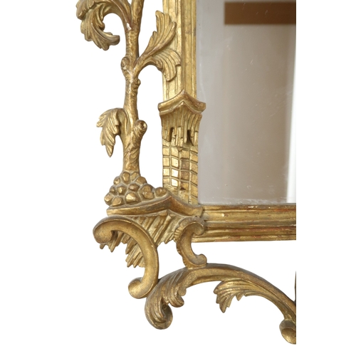 2023 - A GEORGIAN STYLE GILTWOOD CHINESE CHIPPENDALE WALL MIRROR with stylized carved pagoda surmount ... 