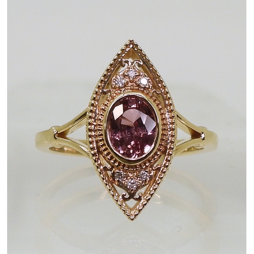 2719 - A SAPPHIRE AND DIAMOND RINGthe 14k marquis shaped mount is set with a padparadscha colour sapph... 