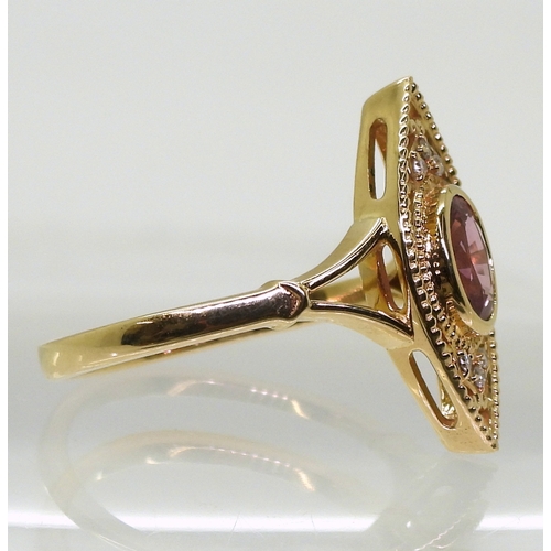 2719 - A SAPPHIRE AND DIAMOND RINGthe 14k marquis shaped mount is set with a padparadscha colour sapph... 