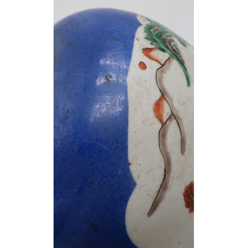 2411 - A CHINESE BLUE GROUND GINGER JAR Painted with landscape panels, exotic birds, flowers and foliage, w... 