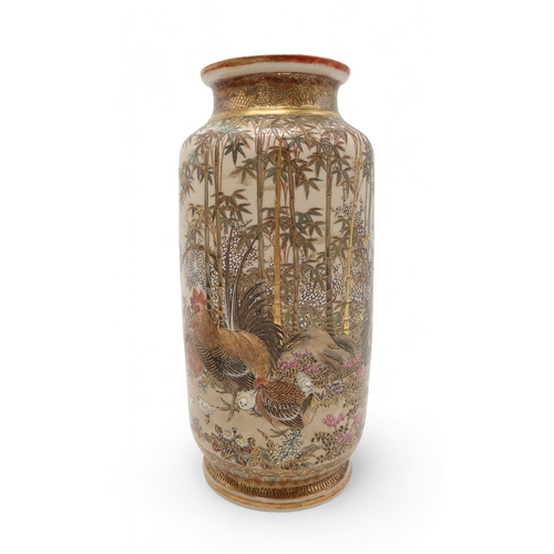 2412 - A PAIR OF SATSUMA CYLINDRICAL VASES Painted with game birds amongst bamboo and blossoming plants, se... 