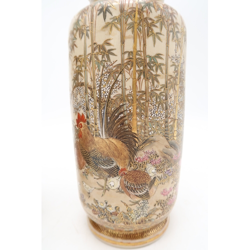 2412 - A PAIR OF SATSUMA CYLINDRICAL VASES Painted with game birds amongst bamboo and blossoming plants, se... 