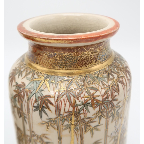 2412 - A PAIR OF SATSUMA CYLINDRICAL VASES Painted with game birds amongst bamboo and blossoming plants, se... 