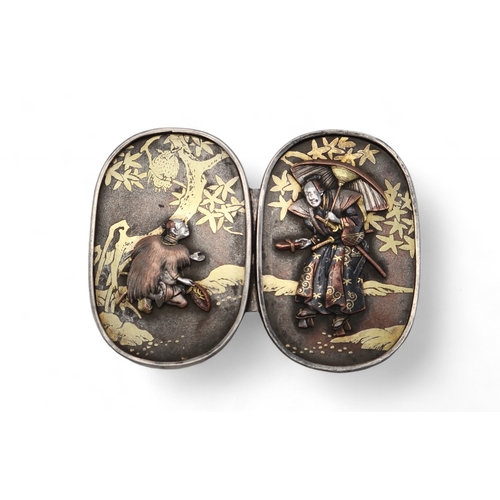 2421 - A JAPANESE BELT BUCKLE In white and yellow metals depicting a Samurai and attendant, with an owl per... 