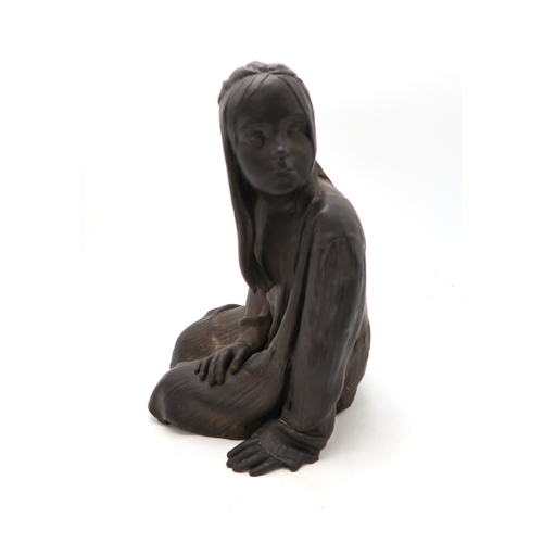 2221 - WALTER AWLSON (SCOTTISH b.1949)A sculpture of a girl in a dress seated on the floor, copper patinate... 