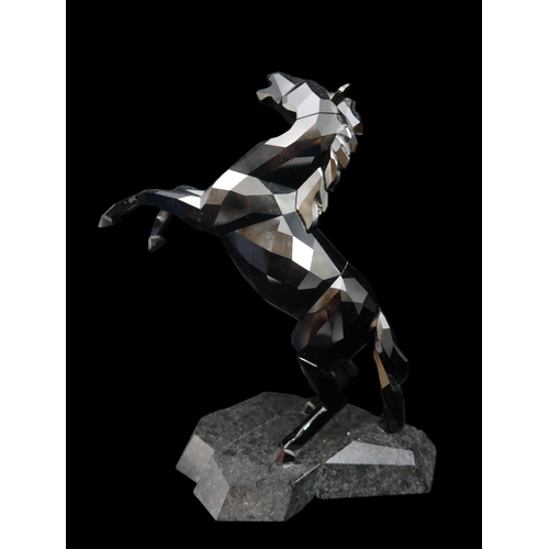 2242 - A SWAROVSKI CRYSTAL SOULMATES COLLECTION FIGURE POWER OF MOTIONmodelled as a rearing back stallion o... 