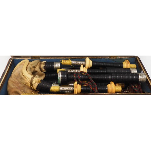 2642 - ROBERT GILLANDERS & SON FORFAR SCOTTISH HIGHLAND BAGPIPESA full set of ebonised white metal and ... 