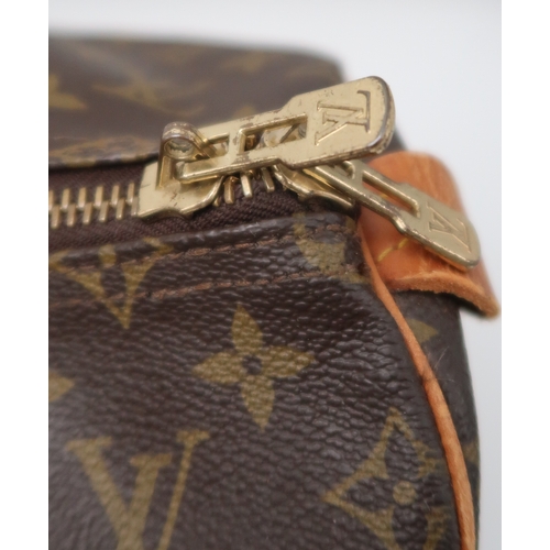 2647 - A LOUIS VUITTON KEEPALL MONOGRAM DUFFLE BAGin monogram coated canvas, with tan vachetta leather trim... 