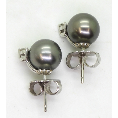 2720 - PEARL & DIAMOND EARRINGSthe large grey pearls are approx 10mm in diameter mounted in 18k white g... 