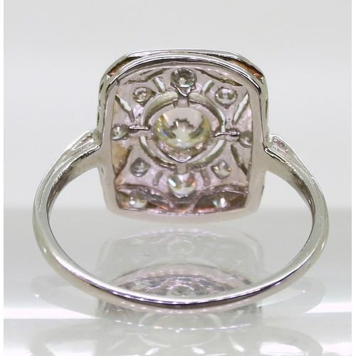 2730 - A DIAMOND PANEL RINGmounted throughout in platinum, with pierced detail. Set with estimated approx 0... 