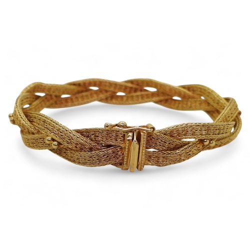 2738 - A WOVEN CHAIN BRACELETmade in bright yellow metal stamped 750 ASIAGOLD. Length 19.5cm, weight 20.2gm... 