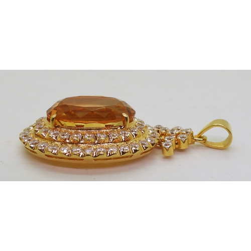 2739 - A CITRINE SUITEset throughout in bright yellow metal, the pendant is set with a large citrine of app... 