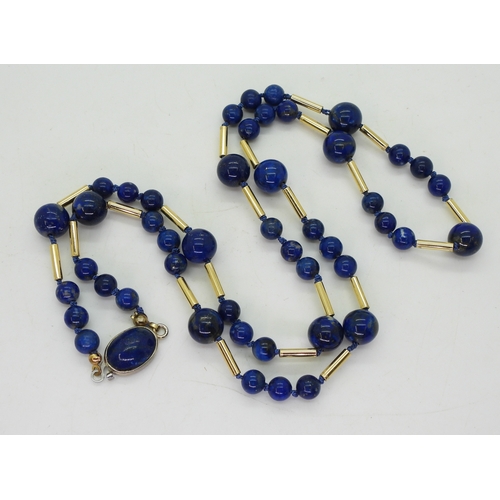 2743 - LAPIS LAZULI BEADSinterspaced with bright yellow metal tube beads, length 68cm, weight 40.4gms, clas... 