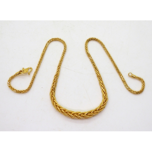 2745 - A FANCY ROPE CHAINmade in bright yellow metal stamped 916, the tapered rope chain is approx 6.8mm in... 