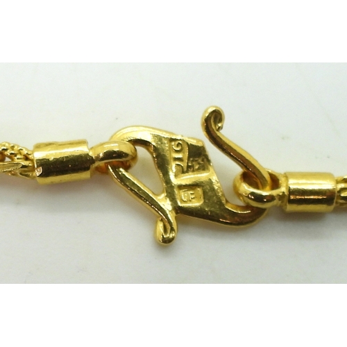 2745 - A FANCY ROPE CHAINmade in bright yellow metal stamped 916, the tapered rope chain is approx 6.8mm in... 