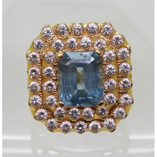 2746 - A BLUE TOPAZ SUITEcomprising of a pendant further set with cubic zirconia, stamped SA 18K to the bac... 