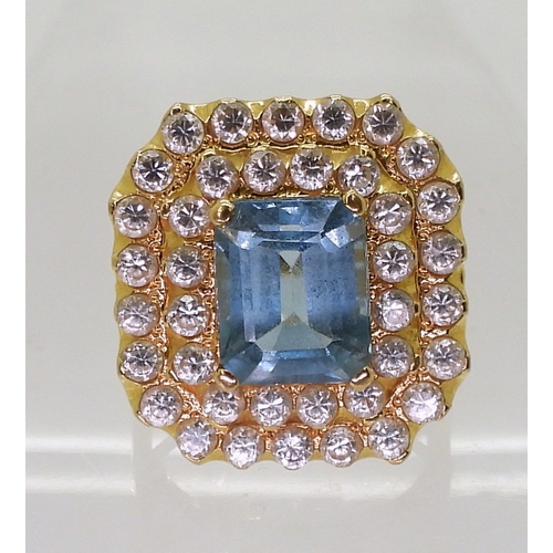 2746 - A BLUE TOPAZ SUITEcomprising of a pendant further set with cubic zirconia, stamped SA 18K to the bac... 