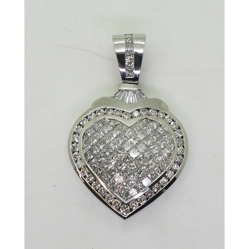 2752 - DIAMOND HEART PENDANTthe mount is craftsman made in white metal (stamped MC) and set throughout with... 