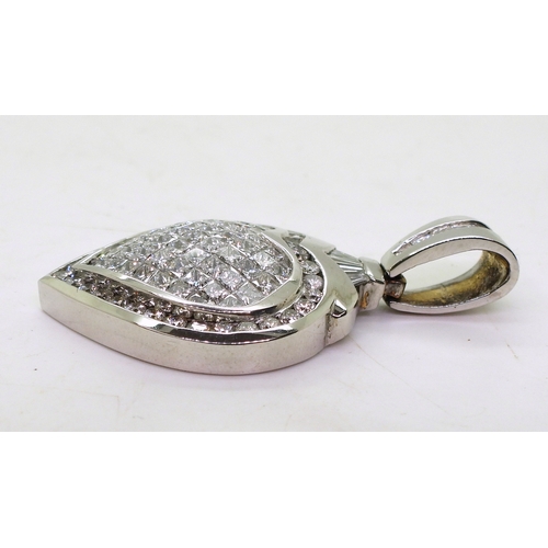 2752 - DIAMOND HEART PENDANTthe mount is craftsman made in white metal (stamped MC) and set throughout with... 