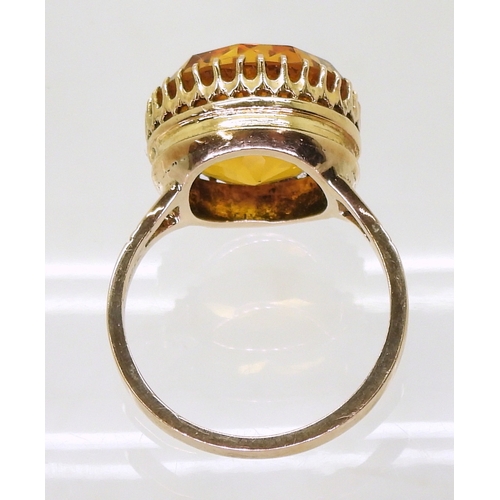 2756 - A CITRINE RINGa statement piece with a 14mm orange citrine in a multi clawed galleried mount, finger... 