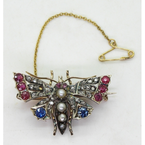 2757 - A GEM SET BUTTERFLY BROOCHmade in yellow and white metal and set with rose cut diamonds, pearls, sap... 