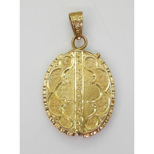 2764 - A COLLECTION OF JEWELSto include a bright yellow metal hinged mourning locket with hair art panel, l... 