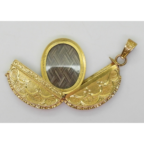 2764 - A COLLECTION OF JEWELSto include a bright yellow metal hinged mourning locket with hair art panel, l... 