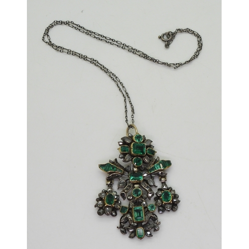 2767 - AN AUSTRO-HUNGARIAN JEWELthe yellow and white metal pendant, set with emeralds in yellow metal cut b... 