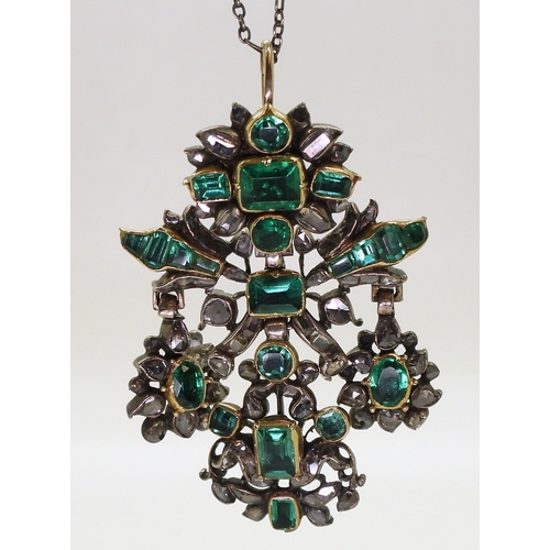 2767 - AN AUSTRO-HUNGARIAN JEWELthe yellow and white metal pendant, set with emeralds in yellow metal cut b... 