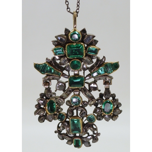 2767 - AN AUSTRO-HUNGARIAN JEWELthe yellow and white metal pendant, set with emeralds in yellow metal cut b... 