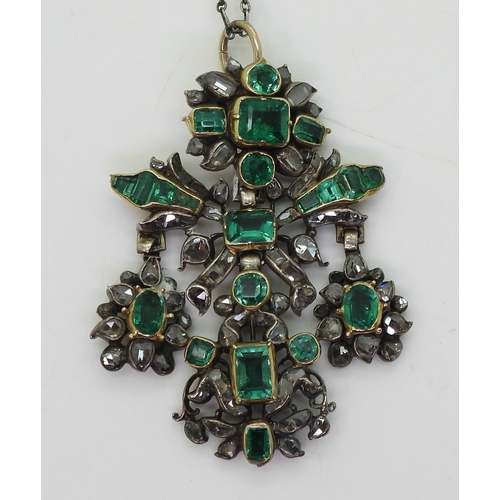 2767 - AN AUSTRO-HUNGARIAN JEWELthe yellow and white metal pendant, set with emeralds in yellow metal cut b... 