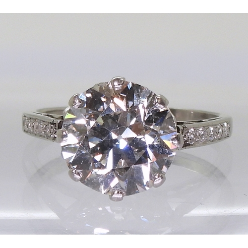 2771 - A SUBSTANTIAL DIAMOND RINGthe diamond is estimated approx at 4cts, mounted in platinum, with a prett... 