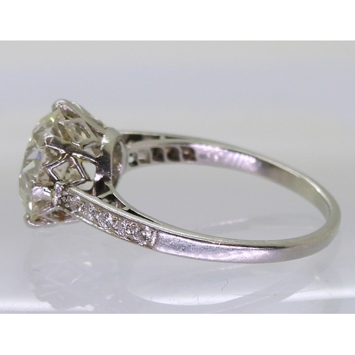 2771 - A SUBSTANTIAL DIAMOND RINGthe diamond is estimated approx at 4cts, mounted in platinum, with a prett... 