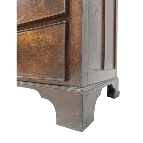 2024 - A LATE 19TH/EARLY 20TH CENTURY OAK LINEN PRESS/WARDROBE with cornice over pair of panelled door... 