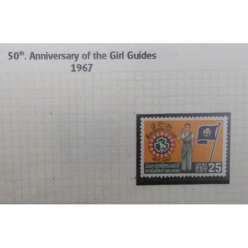 7009 - SCOUTS ON STAMPSThree albums of new and used stamps celebrating the Boy Scouts and Girl Guides mostl... 