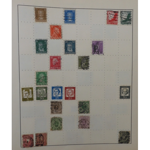 7011 - The Triumph Stamp Album A worldwide stamp collection in an album and stock sheets  together with a s... 