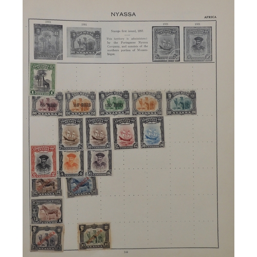 7011 - The Triumph Stamp Album A worldwide stamp collection in an album and stock sheets  together with a s... 