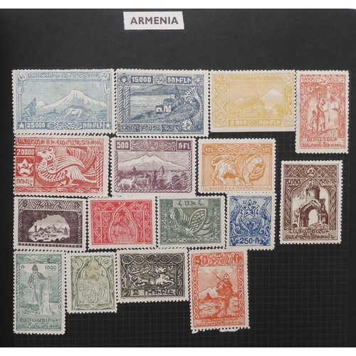 7012 - A worldwide stamp collection in a stock book and albums