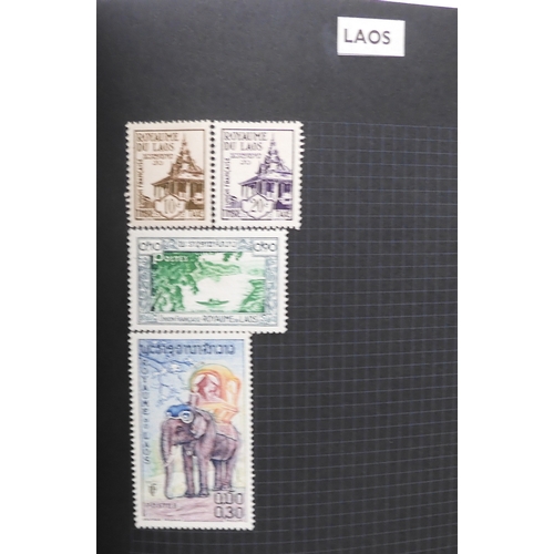 7012 - A worldwide stamp collection in a stock book and albums