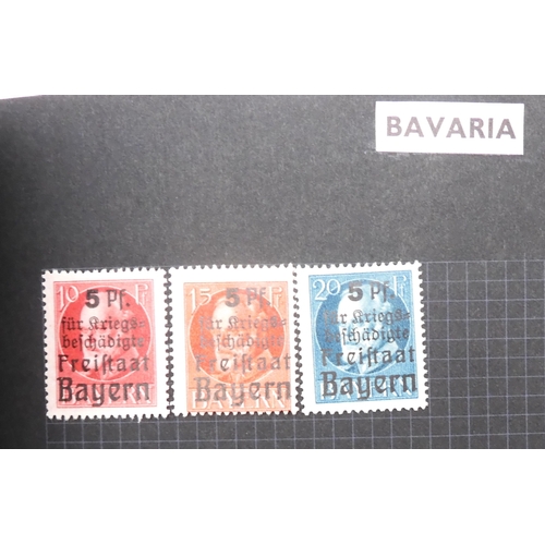 7012 - A worldwide stamp collection in a stock book and albums