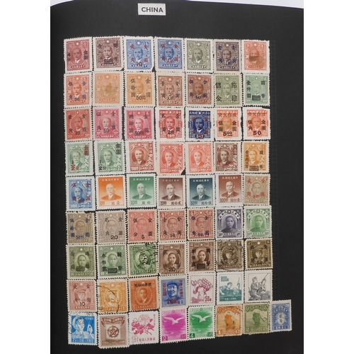 7012 - A worldwide stamp collection in a stock book and albums