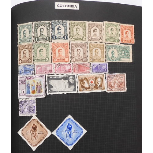 7012 - A worldwide stamp collection in a stock book and albums