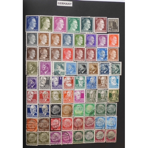 7012 - A worldwide stamp collection in a stock book and albums