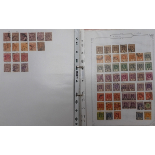 7041 - A world wide stamp collection with seven folders containing sheets of hinged used stamps many early ... 