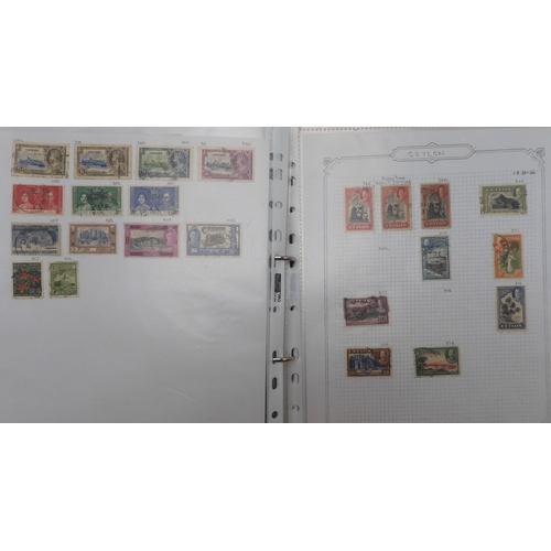 7041 - A world wide stamp collection with seven folders containing sheets of hinged used stamps many early ... 