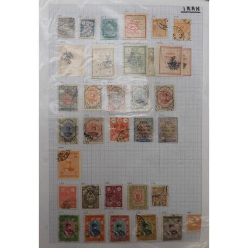 7041 - A world wide stamp collection with seven folders containing sheets of hinged used stamps many early ... 