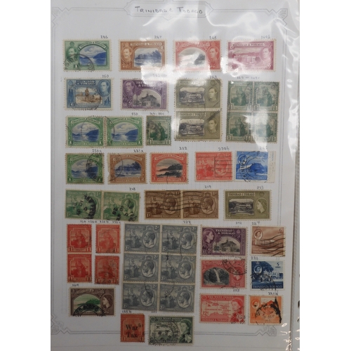 7041 - A world wide stamp collection with seven folders containing sheets of hinged used stamps many early ... 