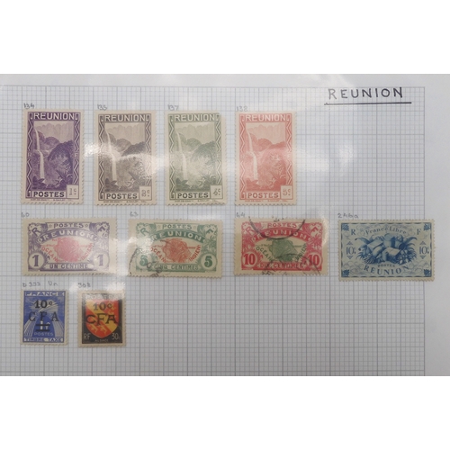 7041 - A world wide stamp collection with seven folders containing sheets of hinged used stamps many early ... 