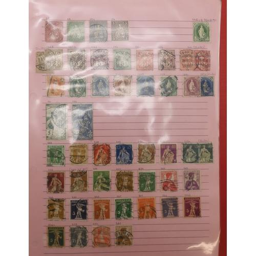 7041 - A world wide stamp collection with seven folders containing sheets of hinged used stamps many early ... 